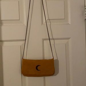 Francesca’s crescent moon handbag
